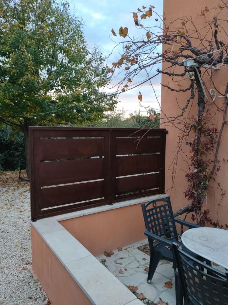 Palissade effet rouillé à Puget