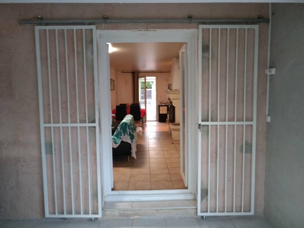 Grilles de défensecoulissantes, porte à Aix en Provence